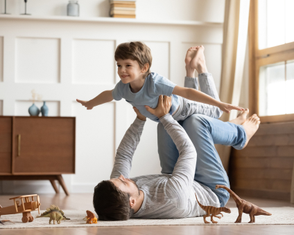 Family relaxing and playing together at home